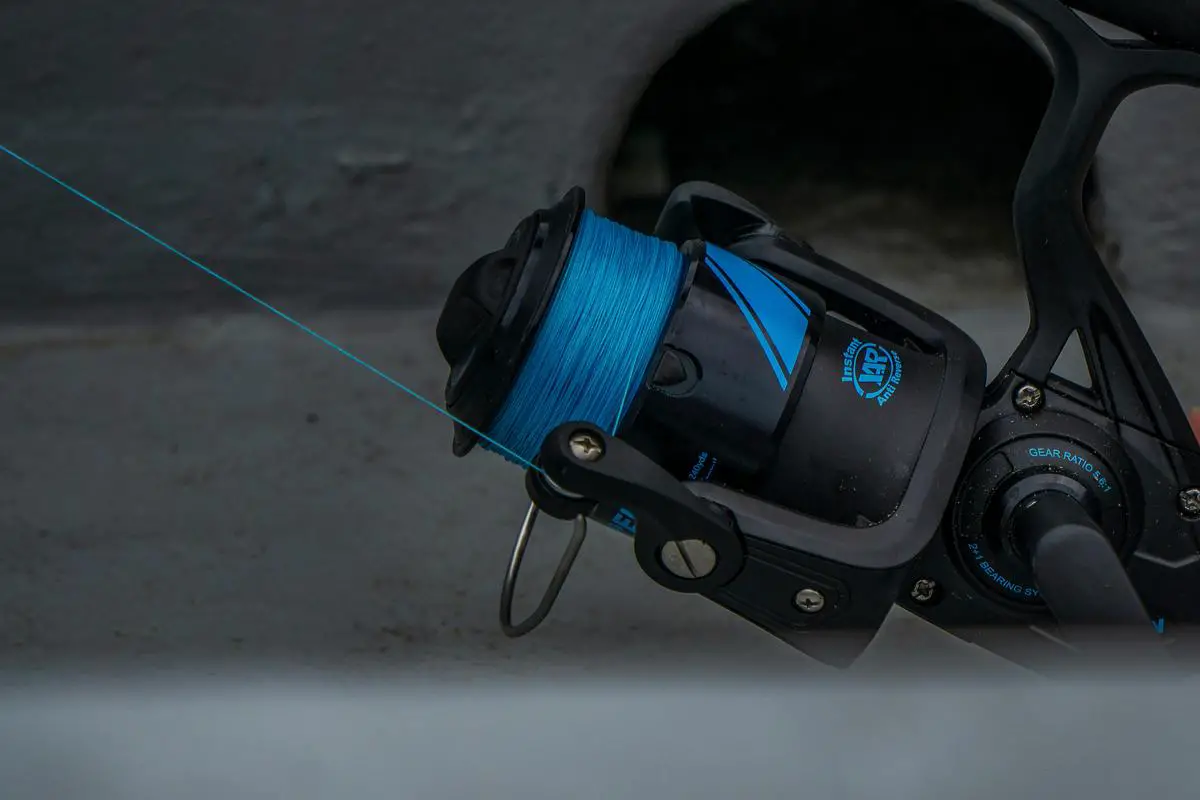 A high-profile fishing reel designed for power and durability, ideal for targeting large fish species